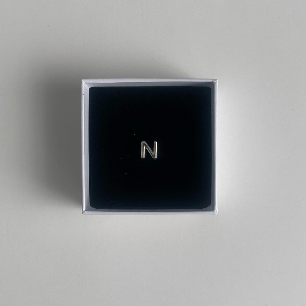 N Initial Charm